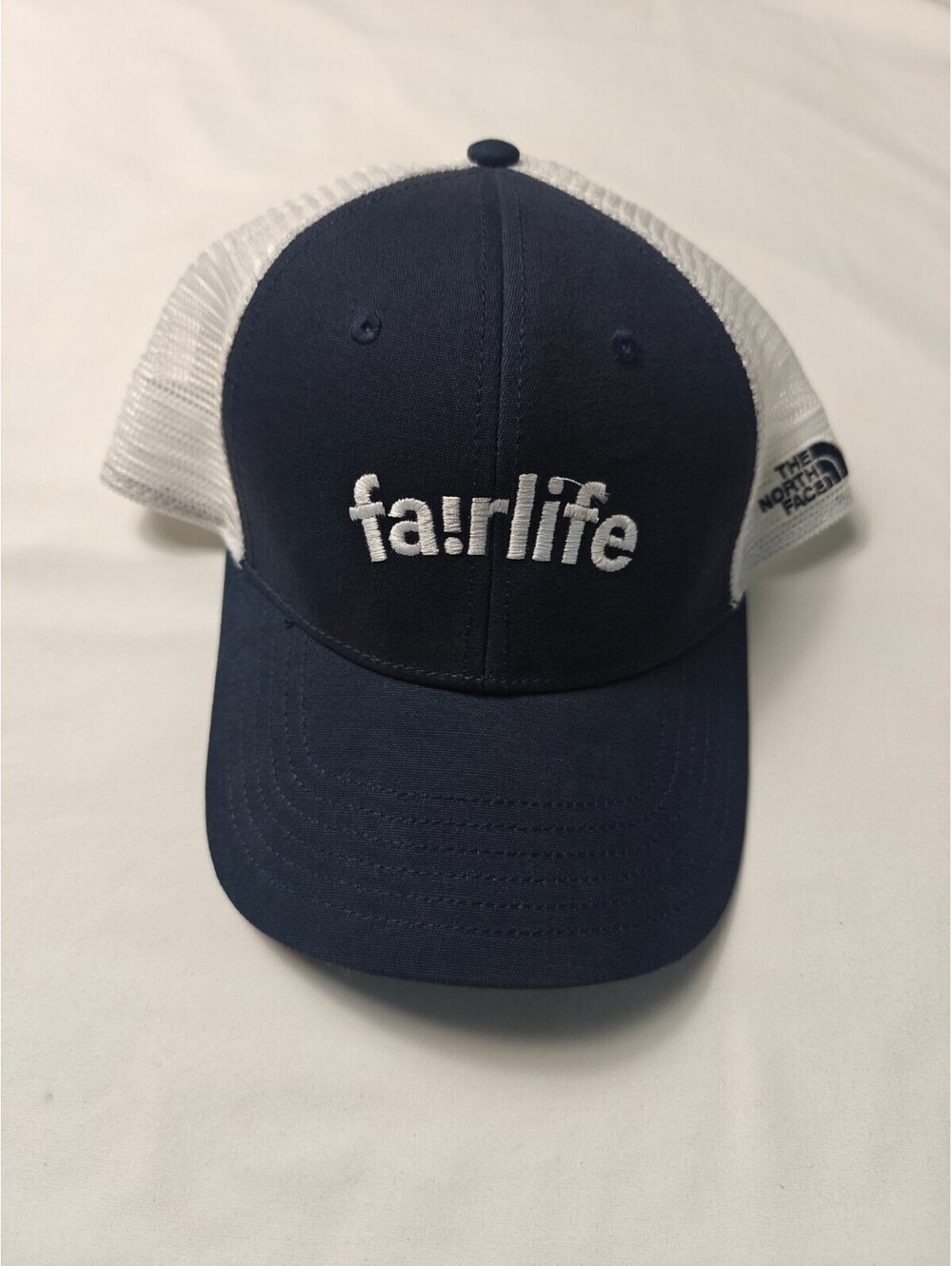 The North Face Fairlife Logo Trucker Hat Navy White Mesh Snapback Adjustable